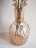 Vase en verre rose
