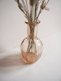 Vase en verre rose